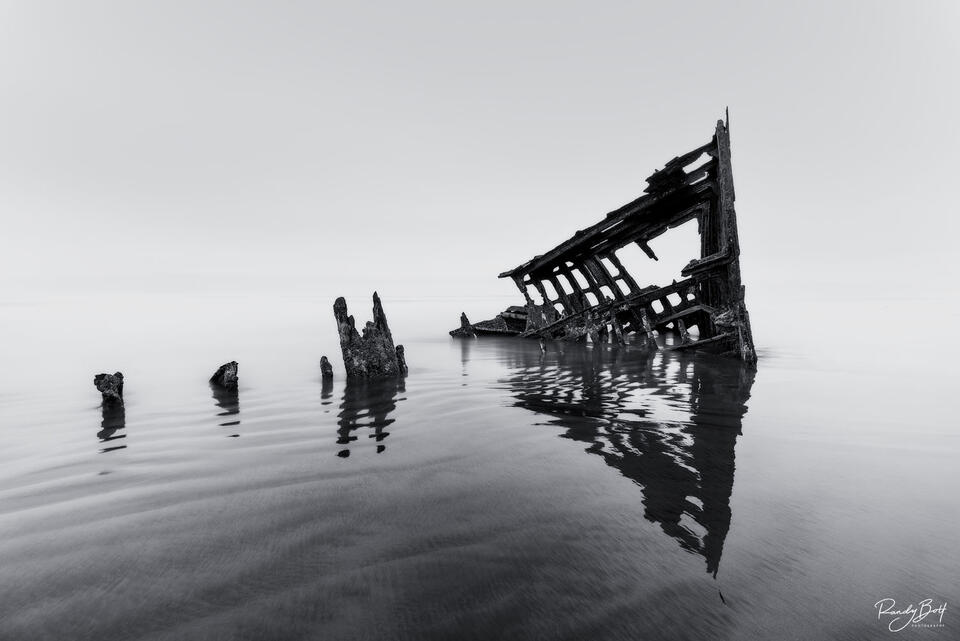 black and white fine art print of the Peter Iredale at Fort Stevens State Park.