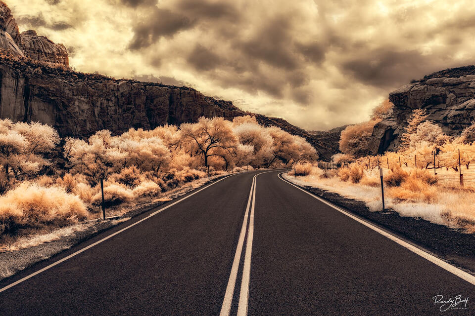 Capitol Reef National Park photographed in 720 nm infrared edited to resemble Mad Max Fury Road
