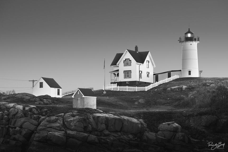 black and white image of the Nubble Lighthouse in York, Maine also known as Cape Neddick Lighthouse.