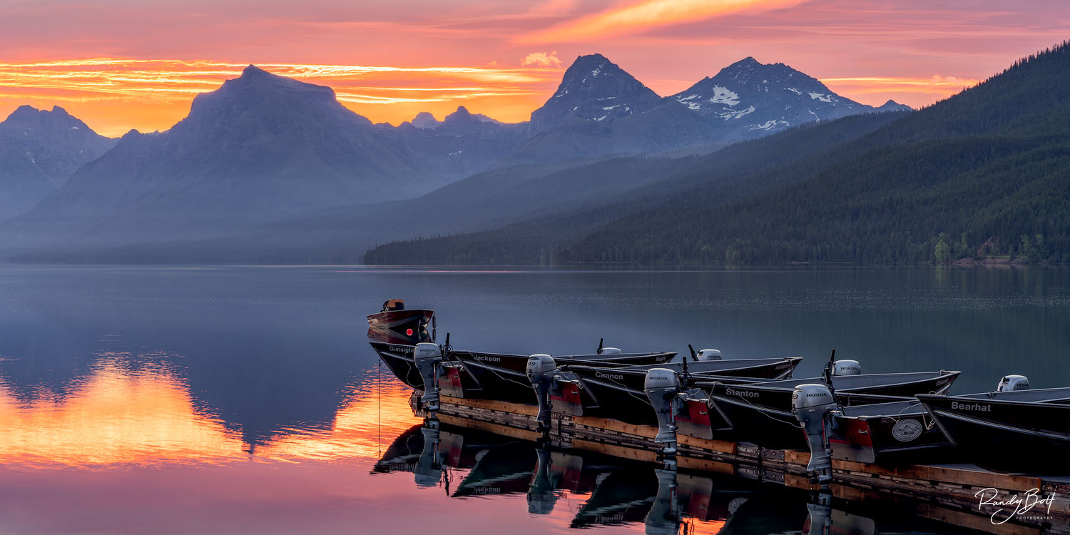 Lake McDonald Boats Sunrise from Apgar Village looking out over Lake McDonald in Glacier National Park
